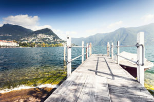 Lugano lake with footbridge and Monte Bre,Lugano,Ticino,Switzerland Lugano lake with footbridge and Monte Bre,Lugano,Ticino,Switzerland